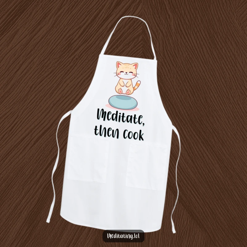 Funny Apron: A cute cat levitating slightly above a meditation cushion, bringing humorous zen to kitchen tasks.