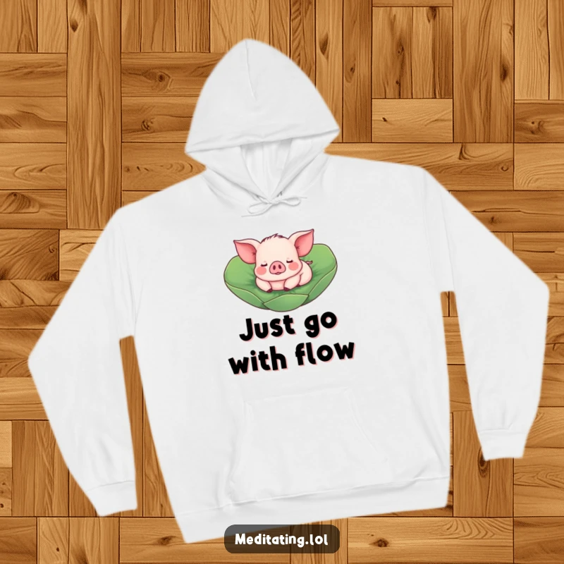 Funny Piglet Hoodie: A contented piglet enjoys a peaceful float on a lotus leaf, offering warmth and amusement.