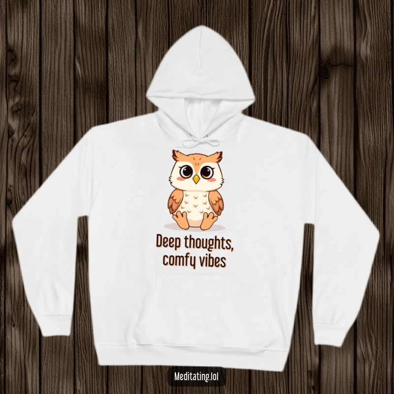 Funny owl hoodie depicting a wise owl in a relaxed meditation pose, offering warmth and whimsical humor for cozy days.