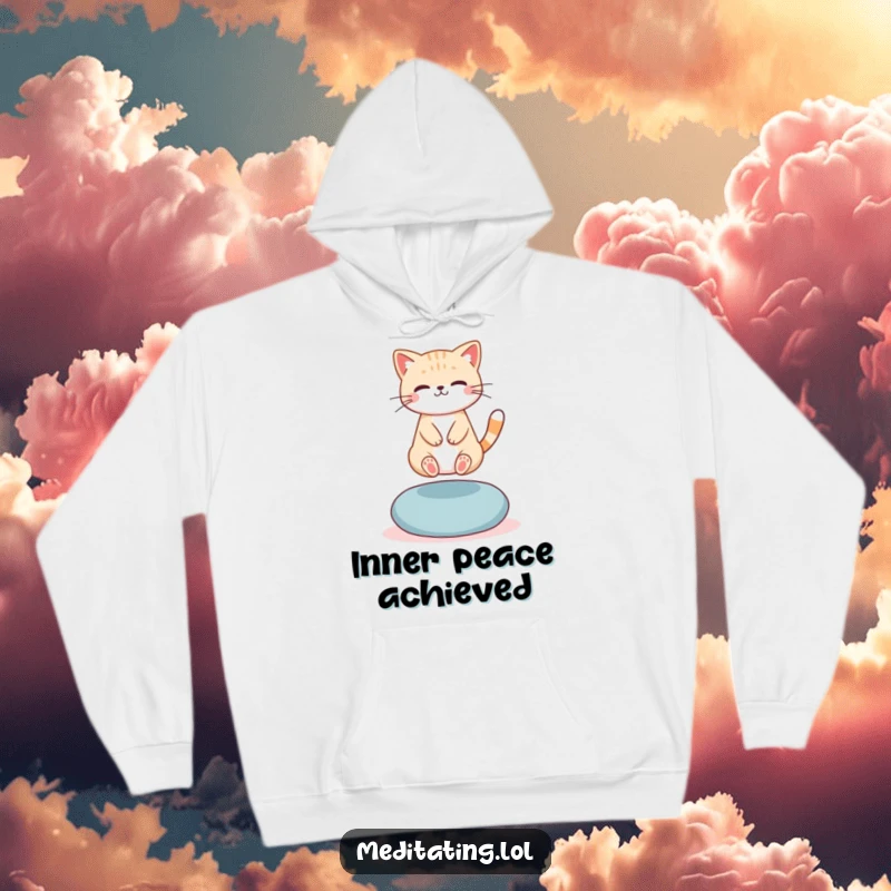 Funny Hoodie: A cute cat levitating slightly above a meditation cushion, embodying humorous spiritual elevation and calm.