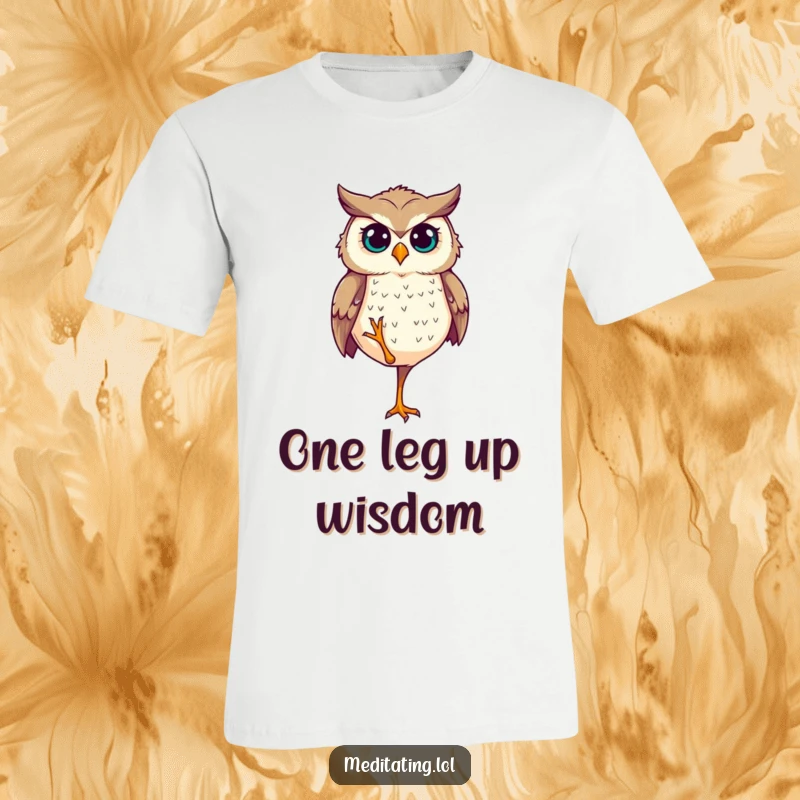 Funny T-Shirt: A determined owl demonstrates incredible balance, standing perfectly upright on a single leg.